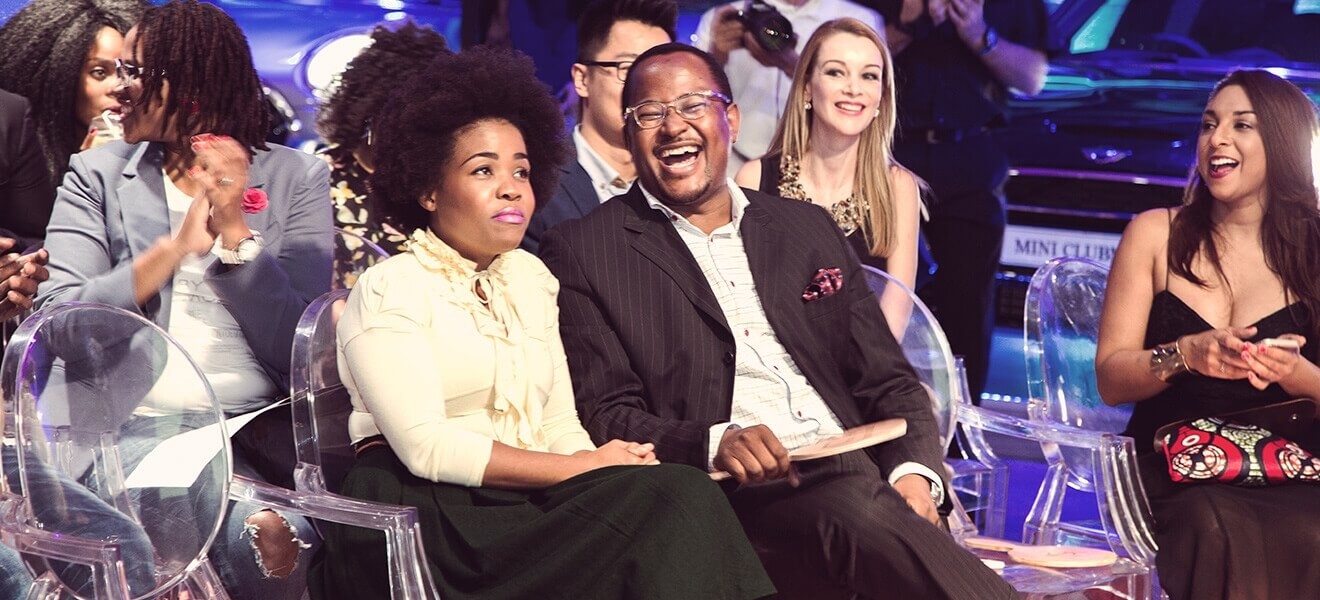 BMW South Africa Group Automotive Communications Manager Edward Makwana and guests enjoy the bidding.